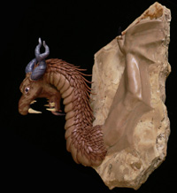 dragon sculpture light brown dragon head with wings